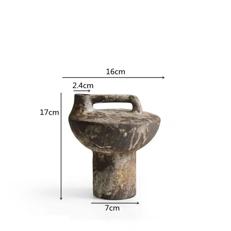 Measurement chart of a small stone object with dimensions labeled.