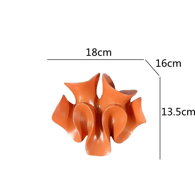 Orange ceramic fish-shaped vase with measurements on a white background