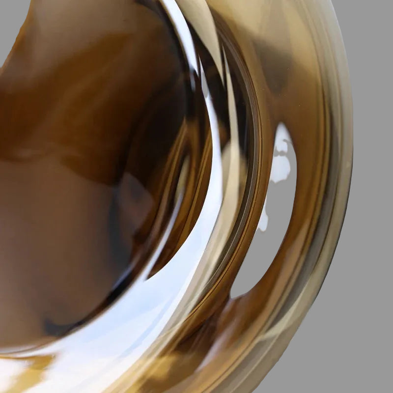 Close-up of a shiny metallic object with reflective surface
