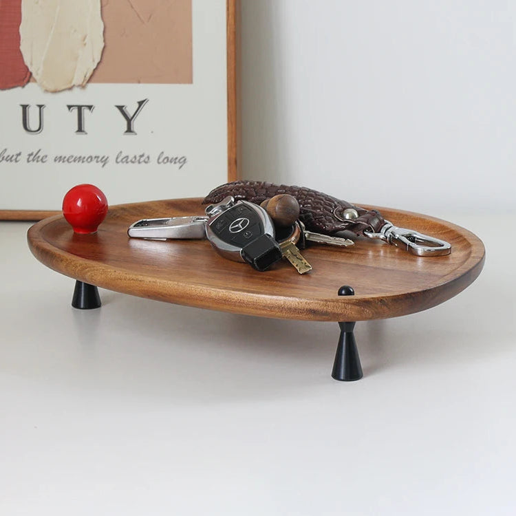 Wooden tray with keys and a red ball on a white surface, with 'ZIZI Fish' branding.