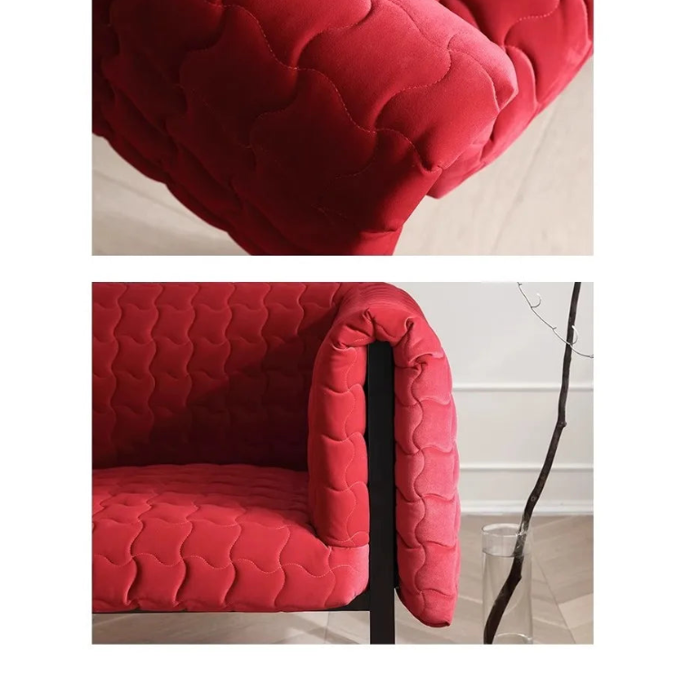 Close-up of a red quilted chair with a blurred background