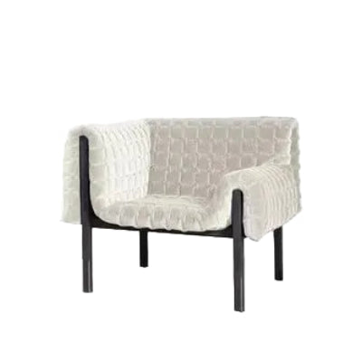 Modern armchair with textured white backrest and black metal frame on a white background