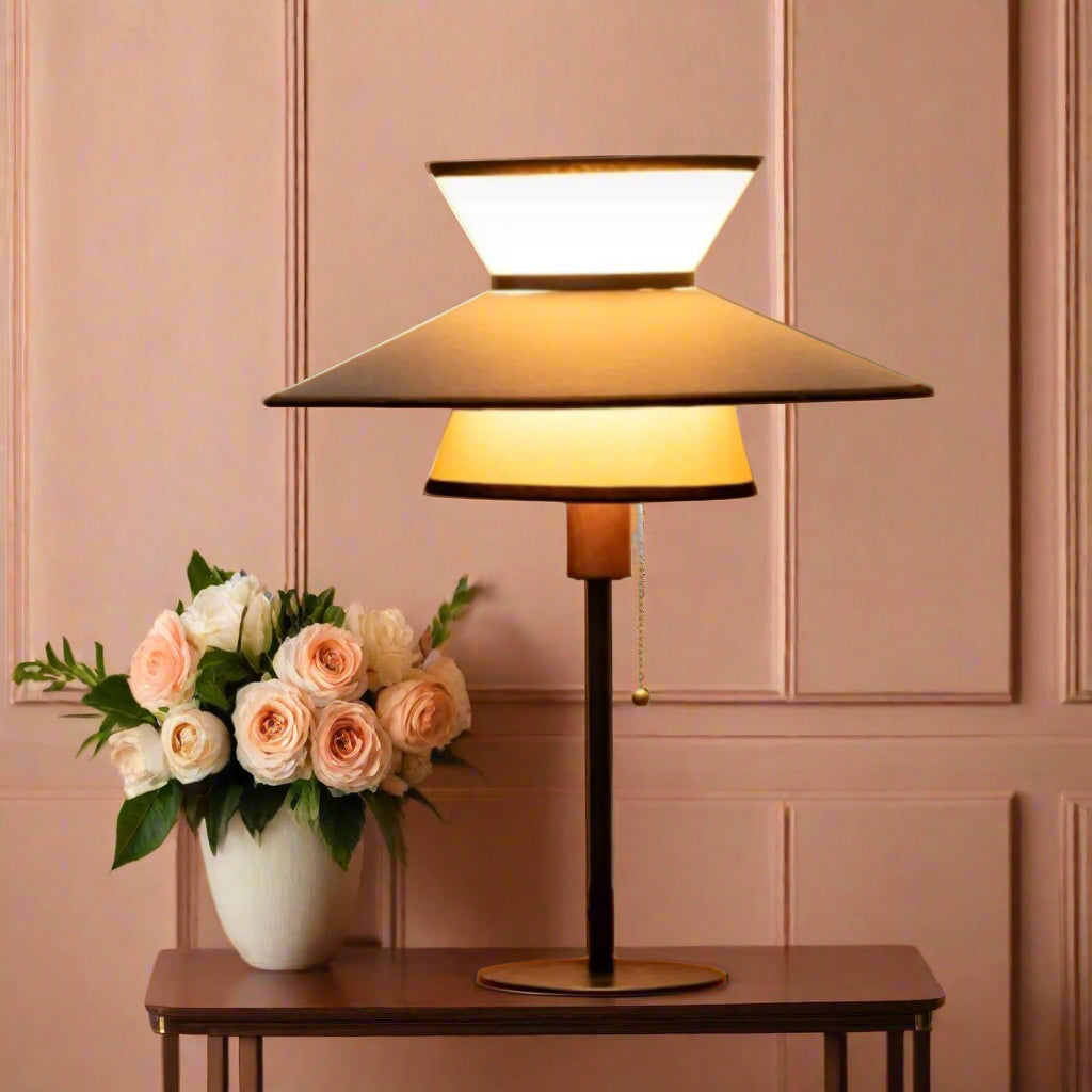 Table lamp on a wooden surface with a warm glow, featuring FSC logo.