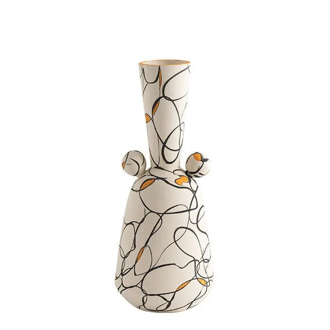 Ceramic vase with decorative patterns on a white background