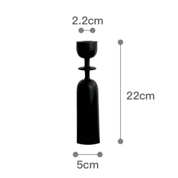 Black vase with measurements on a white background