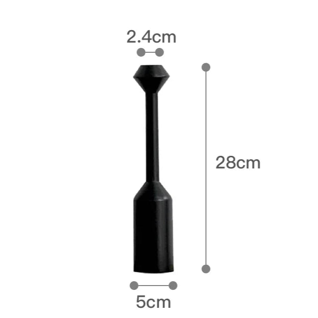 Black cylindrical object with measurements on a white background