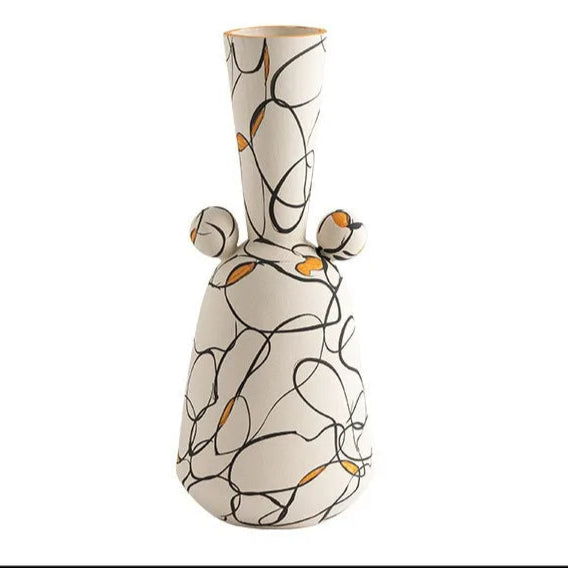 Ceramic vase with decorative patterns on a white background