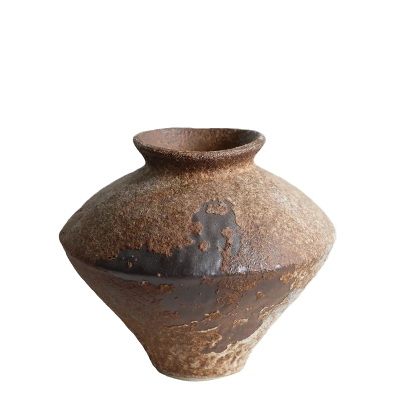 Brown ceramic vase on a white background