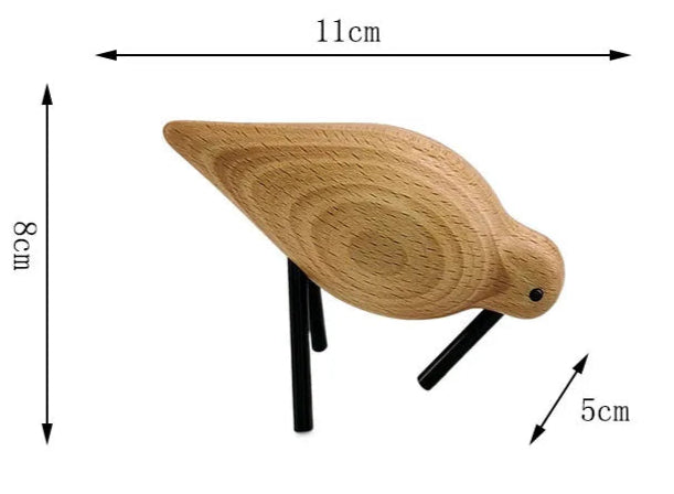 Wooden bird-shaped object with dimensions labeled on a white background